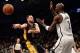 Nov 27, 2013; Brooklyn, NY, USA; Los Angeles Lakers point guard Jordan Farmar (1) makes a no look pass against the Brooklyn Nets during the first half at Barclays Center. The Lakers won 99-94. Mandatory Credit: Joe Camporeale-USA TODAY Sports