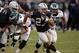 Nov 3, 2013; Oakland, CA, USA; Oakland Raiders running back Rashad Jennings (27) carries the ball against the Philadelphia Eagles at O.co Coliseum. The Eagles defeated the Raiders 49-20. Mandatory Credit: Kirby Lee-USA TODAY Sports
