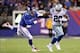 Nov 24, 2013; East Rutherford, NJ, USA; Dallas Cowboys running back DeMarco Murray (29) runs the ball past New York Giants linebacker Jacquian Williams (57) during the third quarter of a game at MetLife Stadium. The Cowboys defeated the Giants 24-21. Mand