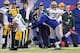 Nov 17, 2013; East Rutherford, NJ, USA; Green Bay Packers tight end Andrew Quarless (81) runs with the ball past New York Giants linebacker Jacquian Williams (57) during the third quarter of a game at MetLife Stadium. Mandatory Credit: Brad Penner-USA TOD
