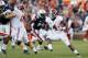 AUBURN, AL - NOVEMBER 30: T.J. Yeldon #4 of the Alabama Crimson Tide runs the ball in the first half against the Auburn Tigers at Jordan-Hare Stadium on November 30, 2013 in Auburn, Alabama. (Photo by Kevin C. Cox/Getty Images)