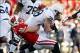 Nov 30, 2013; Madison, WI, USA; Wisconsin Badgers linebacker Chris Borland (44) takes down Penn State Nittany Lions running back Zach Zwinak (28) at Camp Randall Stadium. Mandatory Credit: Mary Langenfeld-USA TODAY Sports
