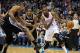 Nov 27, 2013; Oklahoma City, OK, USA; Oklahoma City Thunder small forward Kevin Durant (35) handles the ball against San Antonio Spurs power forward Tim Duncan (21) during the first quarter at Chesapeake Energy Arena. Mandatory Credit: Mark D. Smith-USA T