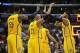 December 1, 2013; Los Angeles, CA, USA; Indiana Pacers center Roy Hibbert (55), power forward David West (21) and small forward Paul George (24) celebrate the 105-100 victory against the Los Angeles Clippers at Staples Center. Mandatory Credit: Gary A. V