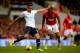 LONDON, ENGLAND - DECEMBER 01: Nacer Chadli of Tottenham Hotspur passes the ball under pressure from Luis Antonio Valencia of Manchester United during the Barclays Premier League Match between Tottenham Hotspur and Manchester United at White Hart Lane on