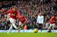 LONDON, ENGLAND - DECEMBER 01: Wayne Rooney of Manchester United scores their second goal from the penalty spot during the Barclays Premier League Match between Tottenham Hotspur and Manchester United at White Hart Lane on December 1, 2013 in London, Engl