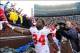 Nov 30, 2013; Ann Arbor, MI, USA; Ohio State Buckeyes running back Carlos Hyde (34) celebrates with fans after defeating Michigan Wolverines 42-41 at Michigan Stadium. Mandatory Credit: Andrew Weber-USA TODAY Sports
