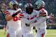 ANN ARBOR, MI - NOVEMBER 30: Quarterback Braxton Miller #5 celebrates a third quarter touchdown with wide receiver Philly Brown #10 and offensive linesman Pat Elflein #65 of the Ohio State Buckeyes against the Michigan Wolverines during a game at Michigan