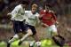 16 May 1999: Ryan Giggs of Manchester United in action against Steffen Freund and Stephen Carr of Tottenham Hotspur during the FA Carling Premiership match against Tottenham Hotspur played at Old Trafford in Manchester, England. The match finished in a2