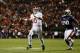 AUBURN, AL - NOVEMBER 30: AJ McCarron #10 of the Alabama Crimson Tide looks to pass against the defense of Dee Ford #30 of the Auburn Tigers in the third quarter at Jordan-Hare Stadium on November 30, 2013 in Auburn, Alabama. (Photo by Kevin C. Cox/Gett