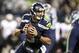 Dec 2, 2013; Seattle, WA, USA; Seattle Seahawks quarterback Russell Wilson (3) looks to pass against the New Orleans Saints during the first quarter at CenturyLink Field. Mandatory Credit: Joe Nicholson-USA TODAY Sports