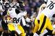 Nov 28, 2013; Baltimore, MD, USA; Pittsburgh Steelers running back Le'Veon Bell (26) runs with the ball against the Baltimore Ravens during a NFL football game on Thanksgiving at M&T Bank Stadium. Mandatory Credit: Evan Habeeb-USA TODAY Sports