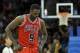 Nov 30, 2013; Cleveland, OH, USA; Chicago Bulls small forward Luol Deng (9) walks to the bench during a timeout in the fourth quarter against the Cleveland Cavaliers at Quicken Loans Arena. Mandatory Credit: David Richard-USA TODAY Sports