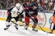 COLUMBUS, OH - NOVEMBER 2: Olli Maatta #3 of the Pittsburgh Penguins and Artem Anisimov #42 of the Columbus Blue Jackets battle for control of the puck on November 2, 2013 at Nationwide Arena in Columbus, Ohio. (Photo by Jamie Sabau/NHLI via Getty Image