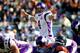 CHICAGO - NOVEMBER 14: Brett Favre #4 of the Minnesota Vikings looks over the Chicago Bear defense before taking the snap at Soldier Field on November 14, 2010 in Chicago, Illinois. The Bears defeated the Vikings 27-13. (Photo by Jonathan Daniel/Getty Ima