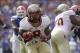 Nov 30, 2013; Gainesville, FL, USA; Florida State Seminoles running back Devonta Freeman (8) runs the ball in for a touchdown against the Florida Gators during the second half at Ben Hill Griffin Stadium. Florida State Seminoles defeated the Florida Gator