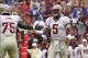 Nov 30, 2013; Gainesville, FL, USA; Florida State Seminoles quarterback Jameis Winston (5) high fives offensive linesman Cameron Erving (75) after they got first down on a penalty against the Florida Gators during the first quarter at Ben Hill Griffin St