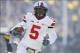 Nov 30, 2013; Ann Arbor, MI, USA; Ohio State Buckeyes quarterback Braxton Miller (5) runs the ball for a touchdown in the second quarter against the Michigan Wolverines at Michigan Stadium. Mandatory Credit: Rick Osentoski-USA TODAY Sports