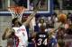 Oct 10, 2013; Auburn Hills, MI, USA; Miami Heat shooting guard Ray Allen (34) attempts a lay up against Detroit Pistons center Andre Drummond (0) during the fourth quarter at The Palace of Auburn Hills. Heat beat the Pistons 112-107. Mandatory Credit: Raj