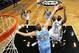 NEW YORK, NY - DECEMBER 3: Timofey Mozgov #25 of the Denver Nuggets blocks a shot against Reggie Evans #30 of the Brooklyn Nets during a game at Barclays Center on December 3, 2013 in the Brooklyn borough of New York City. NOTE TO USER: User expressly ac