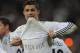 MADRID, SPAIN - FEBRUARY 21: Cristiano Ronaldo of Real Madrid celebrates his goal wearing a t-shirt with the name of the Portuguese island of Madeira in memory of the recent victims of the flooding, during the La Liga match between Real Madrid and Villarr