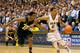 DURHAM, NC - DECEMBER 03: Quinn Cook #2 of the Duke Blue Devils drives against Derrick Walton Jr. #10 of the Michigan Wolverines during play at Cameron Indoor Stadium on December 3, 2013 in Durham, North Carolina. Duke won 79-69. (Photo by Grant Halvers