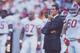 15 OCT 1994: ALABAMA HEAD COACH GENE STALLINGS STANDS ON THE FIELD WITH HIS TEAM BEFORE THE CRIMSON TIDE'S 17-13 VICTORY OVER THE TENNESSEE VOLUNTEERS AT NEYLAND STADIUM IN KNOXVILLE, TENNESSEE Mandatory Credit: Rick Stewart/ALLSPORT