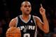 NEW YORK, NY - NOVEMBER 10: Patty Mills #8 of the San Antonio Spurs calls a play during the second half against the New York Knicks at Madison Square Garden on November 10, 2013 in New York City. The Spurs defeat the Knicks 120-89. NOTE TO USER: User ex