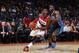 WASHINGTON, DC - DECEMBER 2: John Wall #2 of the Washington Wizards drives against Victor Oladipo #5 of the Orlando Magic during the game at the Verizon Center on December 2, 2013 in Washington, DC. NOTE TO USER: User expressly acknowledges and agrees tha