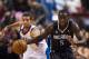 Dec 3, 2013; Philadelphia, PA, USA; Orlando Magic guard Victor Oladipo (5) brings the ball up court under pressure from Philadelphia 76ers guard Michael Carter-Williams (1) during the third quarter at the Wells Fargo Center. The Sixers defeated the Magic