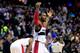 WASHINGTON, DC - NOVEMBER 26: John Wall #2 of the Washington Wizards celebrates during the closing seconds of their 116-111 win over the Los Angeles Lakers at Verizon Center on November 26, 2013 in Washington, DC. NOTE TO USER: User expressly acknowledges