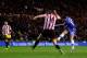 SUNDERLAND, ENGLAND - DECEMBER 04: Eden Hazard of Chelsea (R) scores his second goal during the Barclays Premier League match between Sunderland and Chelsea at the Stadium of Light on December 4, 2013 in Sunderland, England. (Photo by Paul Thomas/Getty Im