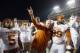 FORT WORTH, TX - OCTOBER 26: Head coach Mack Brown of the Texas Longhorns celebrates with Desmond Jackson #99 of the Texas Longhorns and Josh Turner #5 of the Texas Longhorns after the Longhorns beat the TCU Horned Frogs 30-7 at Amon G. Carter Stadium on