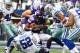 Nov 3, 2013; Arlington, TX, USA; Minnesota Vikings running back Adrian Peterson (28) runs with ball for a touchdown in the fourth quarter against Dallas Cowboys safety Jeff Heath (38) linebacker Justin Durant (52) and Kyle Wilbur (51) and safety Barry Chu