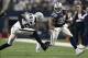 Nov 28, 2013; Arlington, TX, USA; Dallas Cowboys running back DeMarco Murray (29) runs with the ball in the fourth quarter against Oakland Raiders cornerback Charles Woodson (24) during a NFL football game on Thanksgiving at AT&T Stadium. The Cowboys beat
