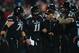 Dec 5, 2013; Cincinnati, OH, USA; Cincinnati Bearcats quarterback Brendon Kay (11) is helped off the field by a trainer after being injured during the third quarter against the Louisville Cardinals at Nippert Stadium. Mandatory Credit: Andrew Weber-USA TO