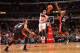 CHICAGO, IL - DECEMBER 5: Kirk Hinrich #12 of the Chicago Bulls passes the ball against the Miami Heat on December 5, 2013 at United Center in Chicago, Illinois. NOTE TO USER: User expressly acknowledges and agrees that, by downloading and or using this