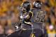 COLUMBIA, MO - OCTOBER 26: Defensive linemen Shane Ray #56 of the Missouri Tigers celebrates with teammate Michael Sam #52 after sacking quarterback Connor Shaw #14 of the South Carolina Gamecocks during the second half on October 26, 2013 at Faurot Fiel