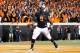 STILLWATER, OK - NOVEMBER 23: Kye Staley #9 of the Oklahoma State Cowboys celebrates his first quarter touchdown against the Baylor Bears at Boone Pickens Stadium on November 23, 2013 in Stillwater, Oklahoma. (Photo by Ronald Martinez/Getty Images)