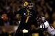 COLUMBIA, MO - NOVEMBER 30: Quarterback James Franklin #1 of the Missouri Tigers scrambles during the game against the Texas A&M Aggies on November 30, 2013 in Columbia, Missouri. (Photo by Jamie Squire/Getty Images)