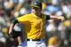 OAKLAND, CA - SEPTEMBER 22: Brett Anderson #49 of the Oakland Athletics pitches against the Minnesota Twins during the sixth inning at O.co Coliseum on September 22, 2013 in Oakland, California. (Photo by Jason O. Watson/Getty Images)