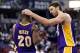 Dec 6, 2013; Sacramento, CA, USA; Los Angeles Lakers center Pau Gasol (16) celebrates with shooting guard Jodie Meeks (20) as the clock runs out against the Sacramento Kings during the fourth quarter at Sleep Train Arena. The Los Angeles Lakers defeated t