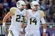 FORT WORTH, TX - NOVEMBER 30: (L-R) Clay Fuller #23 of the Baylor Bears and Bryce Petty #14 celebrate a touchdown against the TCU Horned Frogs at Amon G. Carter Stadium on November 30, 2013 in Fort Worth, Texas. (Photo by Ronald Martinez/Getty Images)