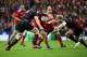 EDINBURGH, SCOTLAND - OCTOBER 12: James Cronin of Munster is tackled by Grant Gilchrist and Dave Denton of Edinburgh during the The Heineken Cup Pool 6 Match between Edinburgh and Munster at Murrayfield Stadium, on October 12, 2013 in Edinburgh, Scotland.