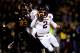 COLUMBIA, MO - NOVEMBER 30: Quarterback Johnny Manziel #2 of the Texas A&M Aggies scrambles as defensive lineman Markus Golden #33 of the Missouri Tigers persues during the game on November 30, 2013 in Columbia, Missouri. (Photo by Jamie Squire/Getty Im
