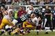 Nov 17, 2013; Philadelphia, PA, USA; Philadelphia Eagles linebacker Connor Barwin (98) and defensive tackle Bennie Logan (96) combine to tackle Washington Redskins running back Alfred Morris (46) during the second quarter at Lincoln Financial Field. Manda