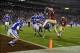 Dec 7, 2013; Charlotte, NC, USA; Florida State Seminoles quarterback Jameis Winston (5) scores a touchdown as Duke Blue Devils cornerback Bryon Fields (14) and linebacker David Helton (47) and defensive end Kenny Anunike (84) and safety Dwayne Norman (40)