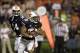 Aug 31, 2013; Auburn, AL, USA; Auburn Tigers running back Corey Grant (20) runs after taking a handoff from quarterback Nick Marshall (14) during the second half against the Washington State Cougars at Jordan Hare Stadium. The Tigers beat the Cougars 31-
