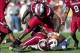 Nov 2, 2013; Columbia, SC, USA; South Carolina Gamecocks defensive end Jadeveon Clowney (7) tackles Mississippi State Bulldogs wide receiver De'Runnya Wilson (81) during the fourth quarter at Williams-Brice Stadium. The Gamecocks defeated the Bulldogs 34-