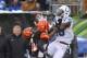CINCINNATI, OH - DECEMBER 08: Da'Rick Rogers #16 of the Indianapolis Colts goes up for the pass against the pressure of Adam Jones #24 of the Cincinnati Bengals during their game at Paul Brown Stadium on December 8, 2013 in Cincinnati, Ohio. (Photo by J